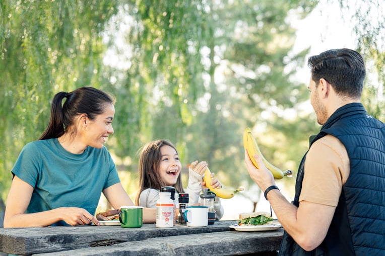 Bottle of Daily Build Liquid multivitamin with plant-based ingredients, supporting overall wellness, heart, brain, immune, and bone health. livepure.com